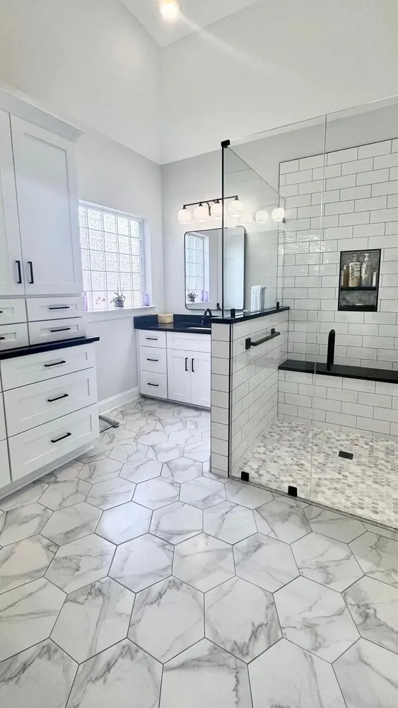 Bathroom remodel with hexagon floor tile and walk-in shower by Braga Remodeling in Jacksonville, FL